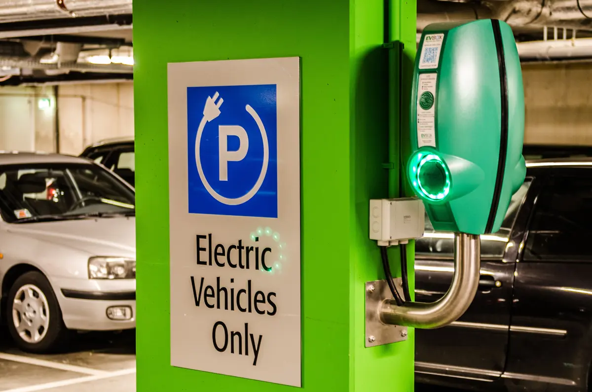An electric charging point in an underground car park