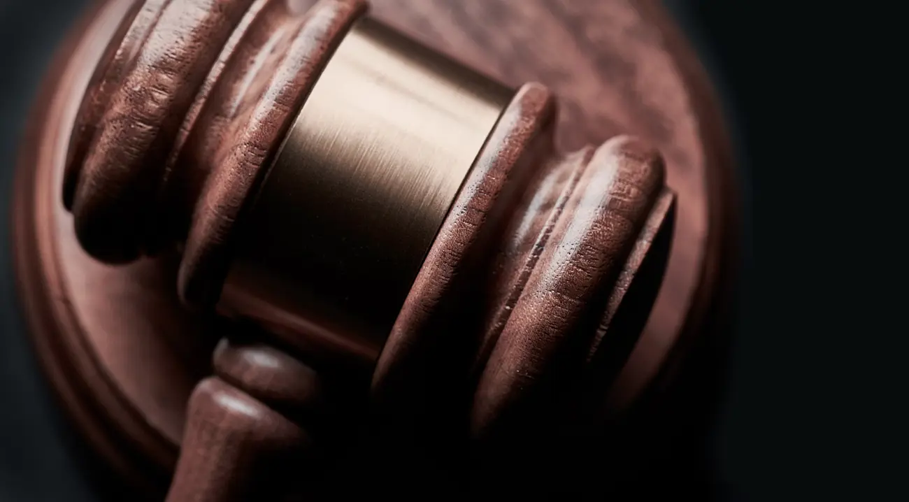 An auction gavel on a stand