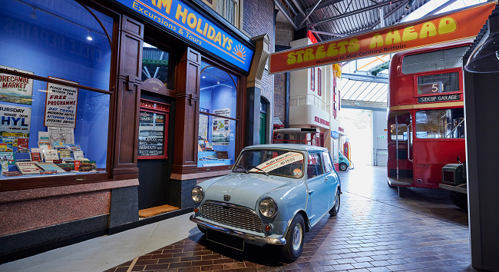 Blue car in street