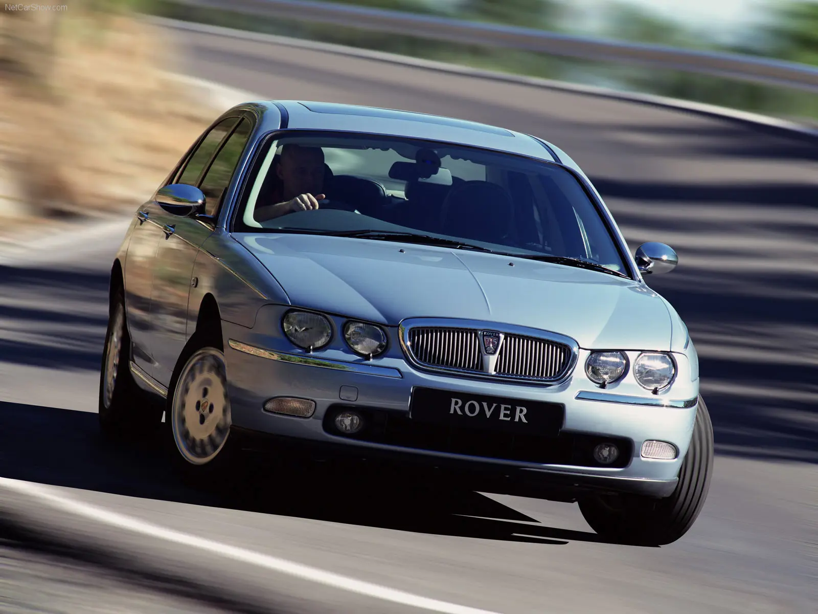 Classic Rover driving on race track