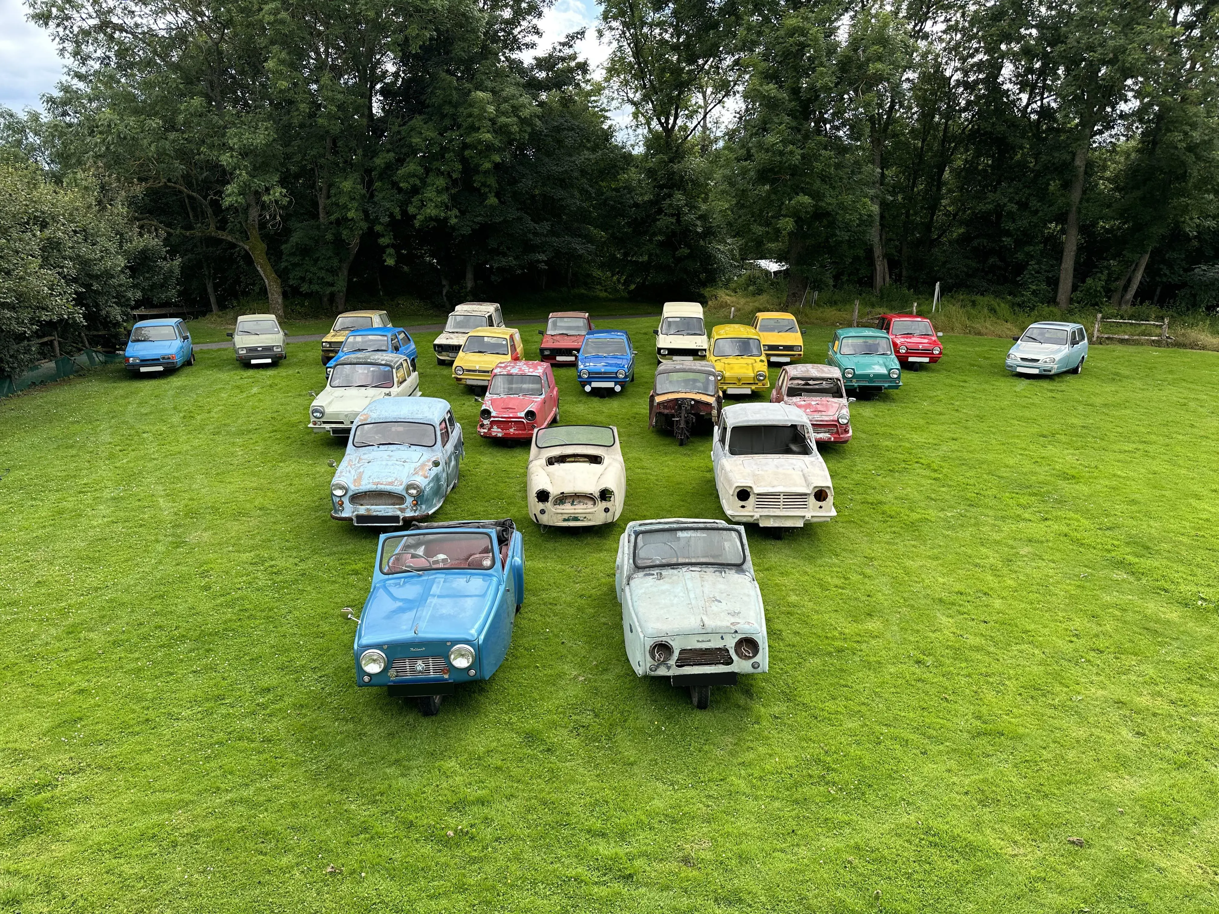 Cars in field