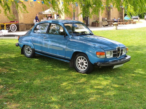 Blue car on grass