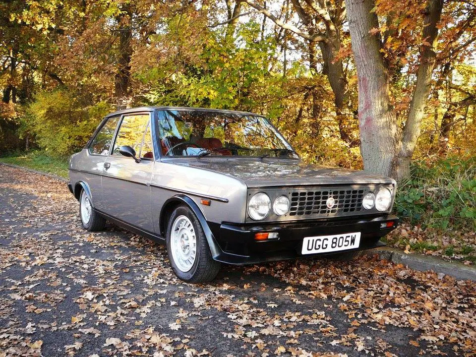 autumn leaves and classic car