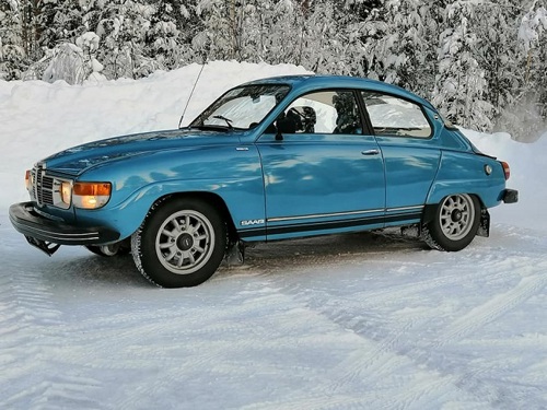 Blue car in snow